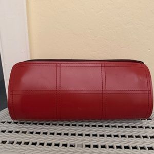 Este Lauder red cosmetic bag.